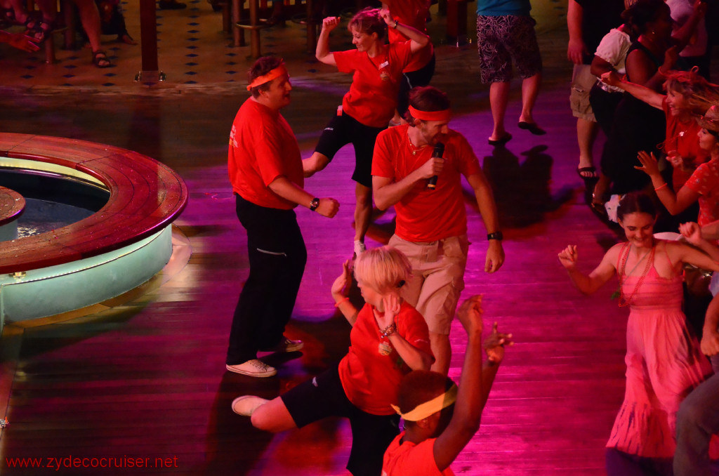 222: Carnival Conquest, Roatan, Deck party, CD Noonan doing a whacky dance step, 