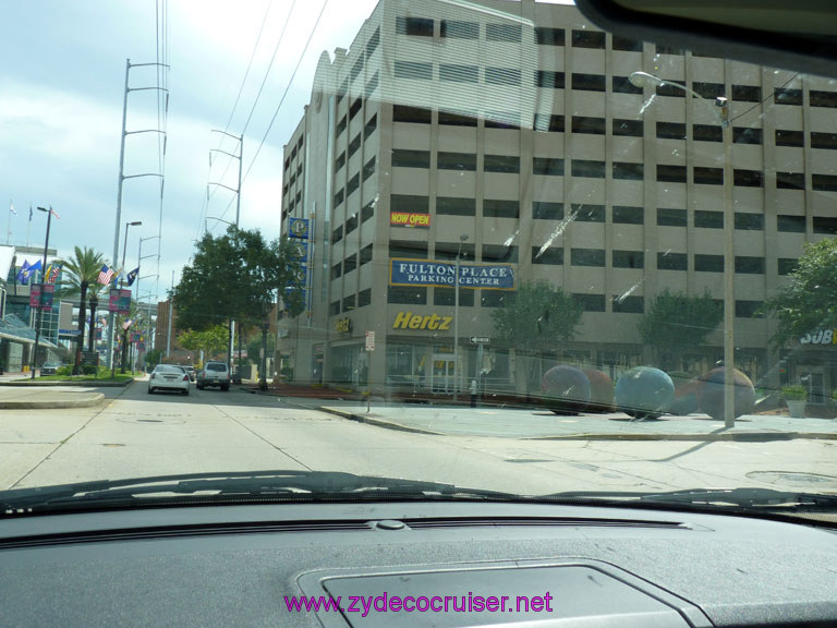 038: Driving along Convention Center Blvd, New Orleans, LA, Fulton Street Garage